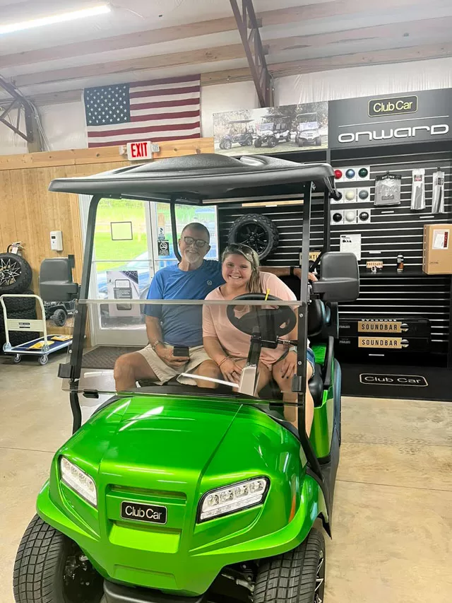 happy customers at Allison Golf Cars